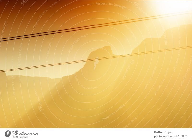 Mountain range in the sunshine Summer Nature Sunrise Sunset Sunlight Beautiful weather Warmth Alps Peak Hiking Authentic Exceptional Yellow Red Emotions Moody