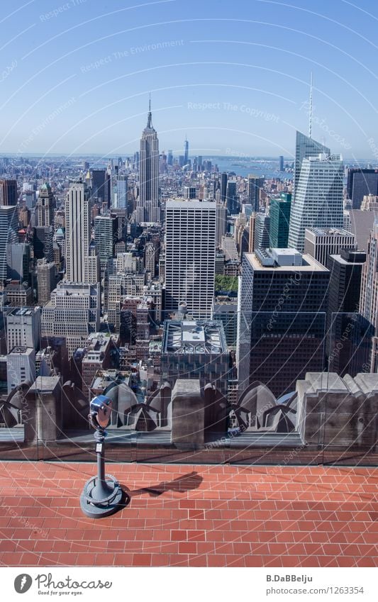 The Chrysler Building offers a great view of the New York skyline and the Empire State Building rises up into the sky in the middle. New York City USA