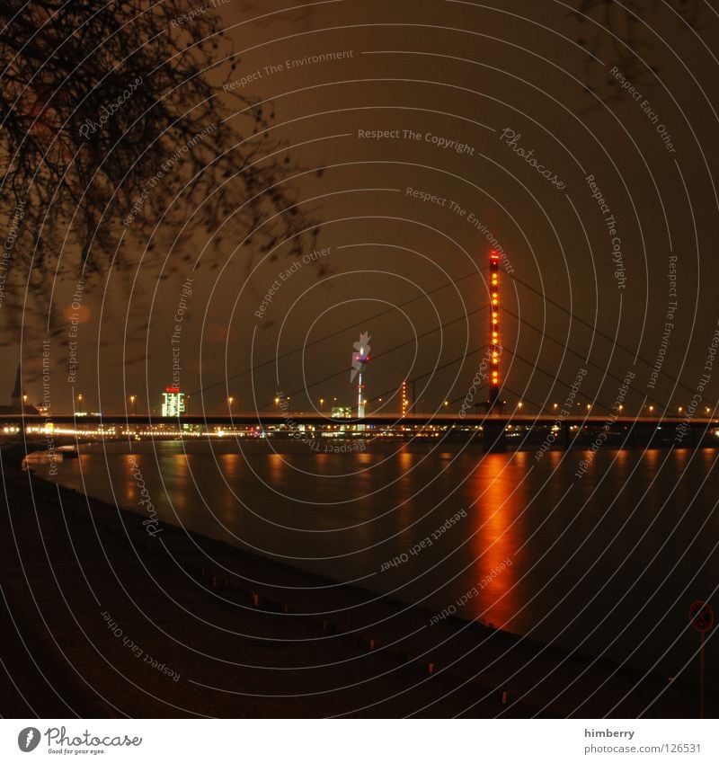 dTown citylights I Lifestyle Night life Transmit Transmitting station Long exposure Exposure City life High-rise Column Bridge pier Duesseldorf Evening Modern