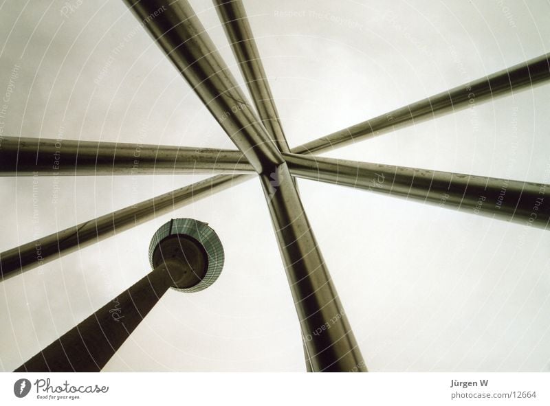 skywards Rheinturm Steel Clouds Gray Sky Architecture Duesseldorf consumption clock Tall rhine-tower high grey