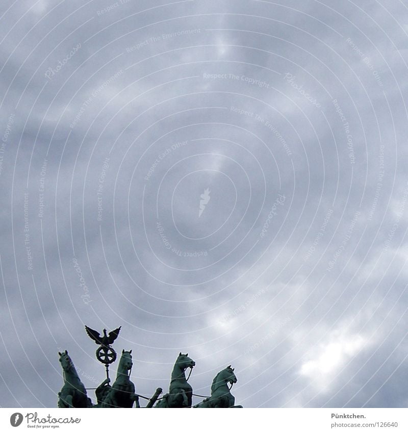 Quadriga in square Brandenburg Gate Horse Carriage 4 Nike Horse-drawn carriage Clouds Dark Gray Bad weather Monument Statue Verdigris Unter den Linden Entrance