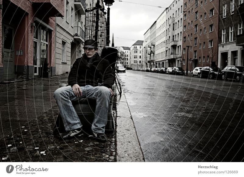 Sitting in Berlin Armchair Empty Harrowing Moody Gray Negative Hope Trash Grief Distress Sebastian Contrast Street youth press youth photos Loneliness Rain Fear