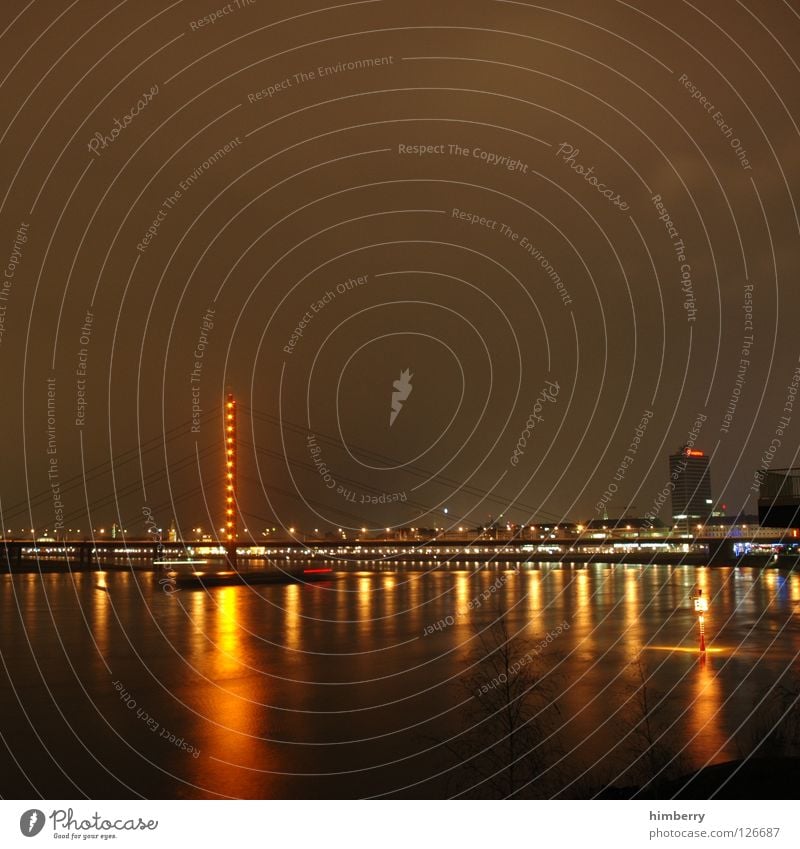 dTown citylights III Lifestyle Night life Transmit Transmitting station Long exposure Exposure City life High-rise Column Bridge pier Duesseldorf Evening Modern