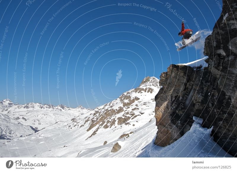 Will goes over the Rock Peak Background picture Jump Ledge Endurance White Switzerland Silvaplana Ski tour Snowboard Tracks Deep snow Sporting event Winter