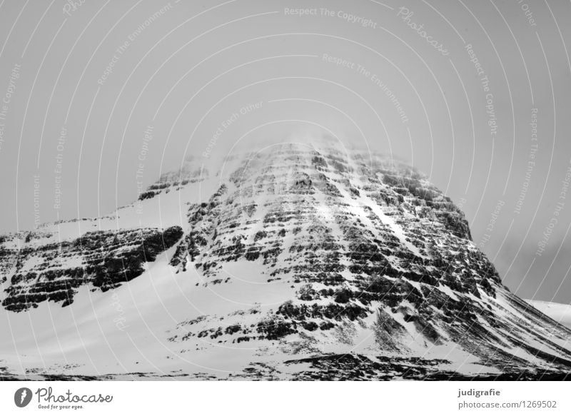 Iceland Environment Nature Landscape Climate Weather Snow Rock Mountain Snowcapped peak Threat Dark Cold Natural Moody Black & white photo Exterior shot