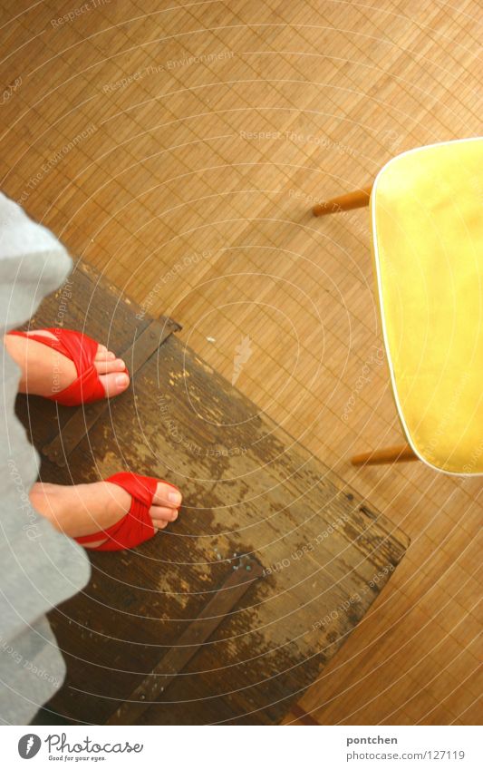 Furnishing style. Vintage furniture.  Woman in red shoes on wooden box. Colour photo Interior shot Copy Space top Bird's-eye view Joy Playing Children's game