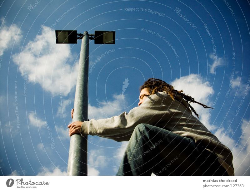 stretching Clouds Sky blue Beautiful Brilliant Light Sunlight Altocumulus floccus Lamp Artificial light 2 Luminosity Steel Worm's-eye view Man Skeptical