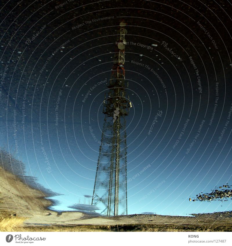 to the stars Half-timbered facade Transmitting station Antenna Telegraph pole Mobile communications Puddle Large Illusion Mirror Reflection Industrial Industry