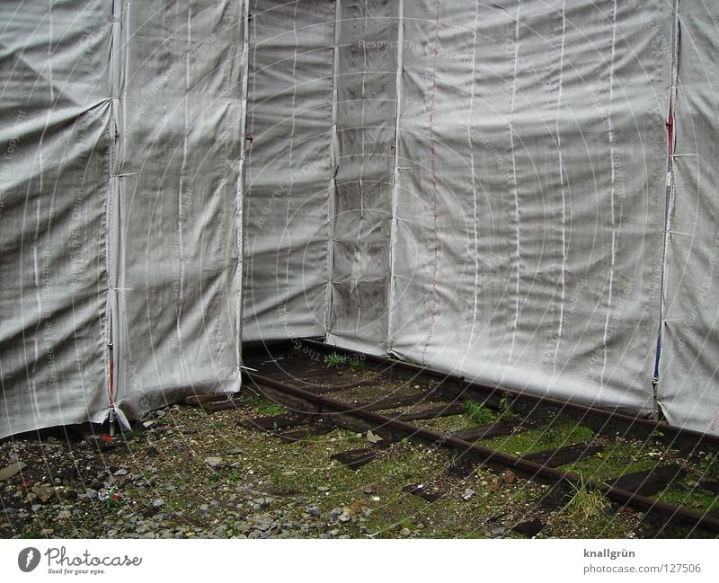 hung Packaged White Brown Packing film Railroad tracks Railroad tie Construction site Stripe Concealed Derelict Industry Transience Sheath Structures and shapes