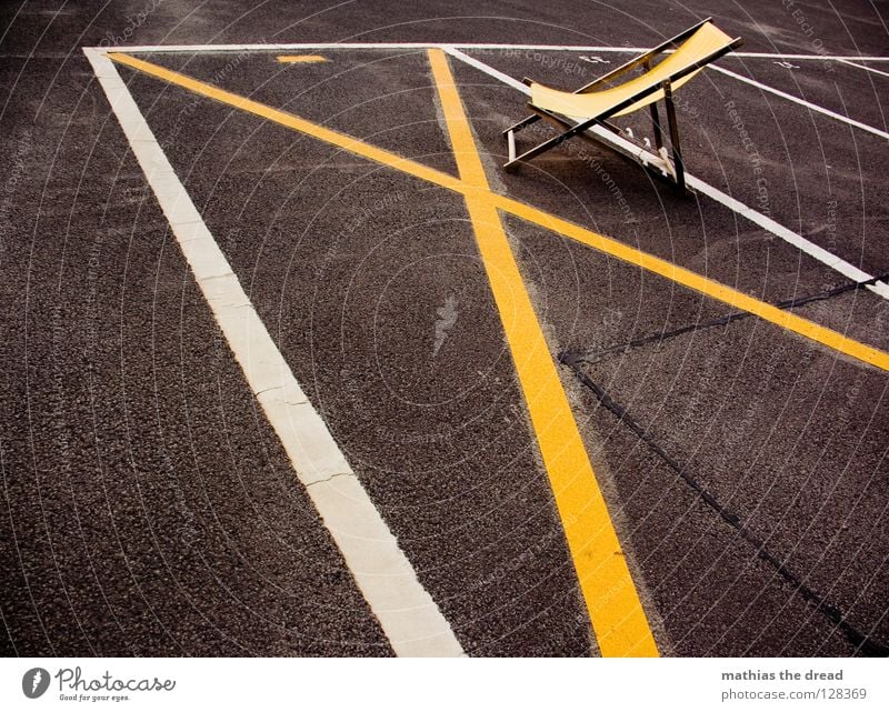 NO SUNBATHING! Places Structures and shapes Parking lot Rectangle Stripe Asphalt Tar Hard Pore Black Parking garage Deckchair Comfortable Summer Wood Yellow