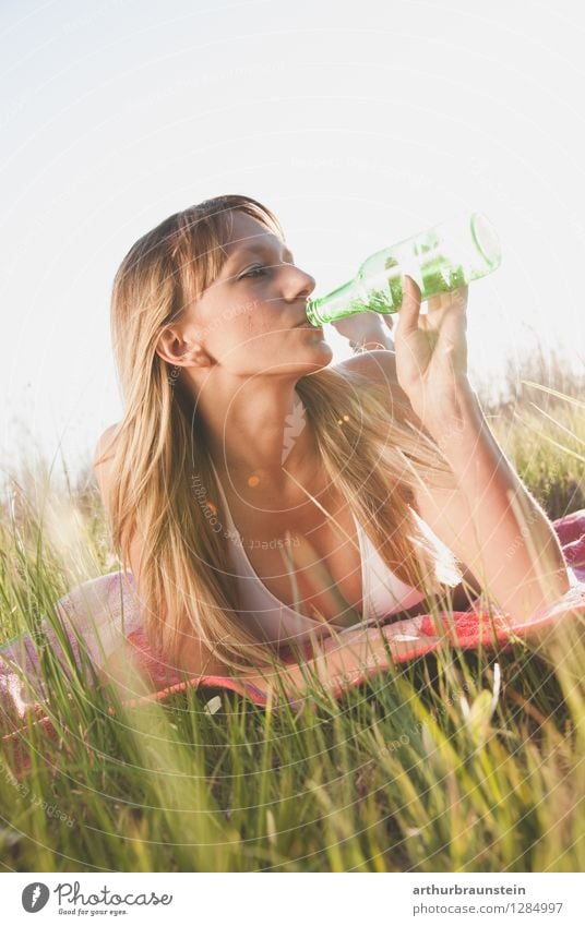 Refreshment in the sun Beverage Drinking Beer Bottle Joy Hair and hairstyles Alcoholic drinks Summer Sun Sunbathing Human being Feminine Young woman