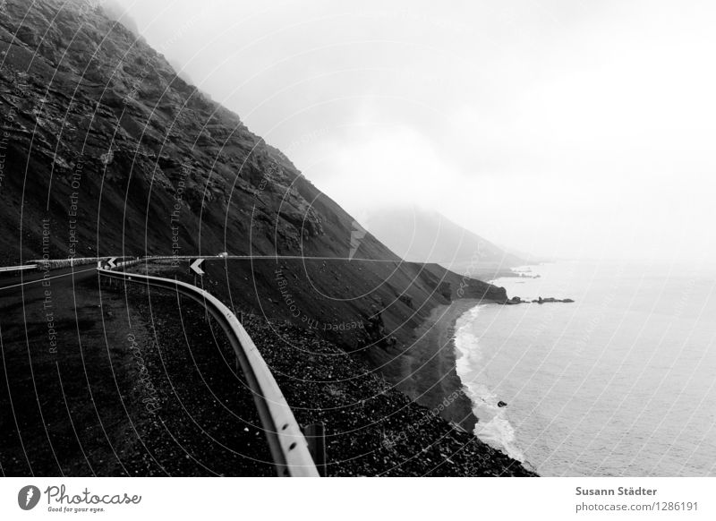 Iceland Landscape Water Horizon Autumn Hill Rock Mountain Bay Ocean Driving Threat Dark Cold Coastal road Crash barrier Gravel Rough Black & white photo