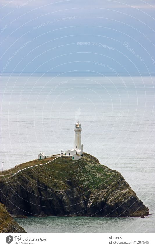 lighthouse Rock Coast Ocean Island Anglesey Wales Lighthouse Sign Considerate Horizon Communicate Surveillance Trust Target Road marking Colour photo