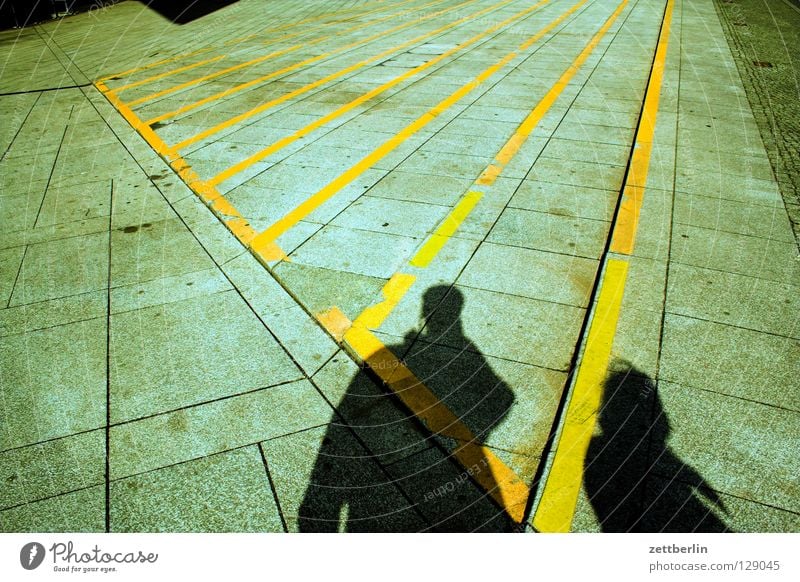 shadow Stripe Colour Guide Central perspective Vanishing point Places Neue Mitte Woman Man Relationship Couple 2 Traffic infrastructure Human being Stairs