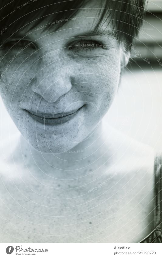 Young woman with many freckles and greens smiles at the camera Trip Flirt Youth (Young adults) pit Freckles 18 - 30 years Adults Dress Brunette Short-haired