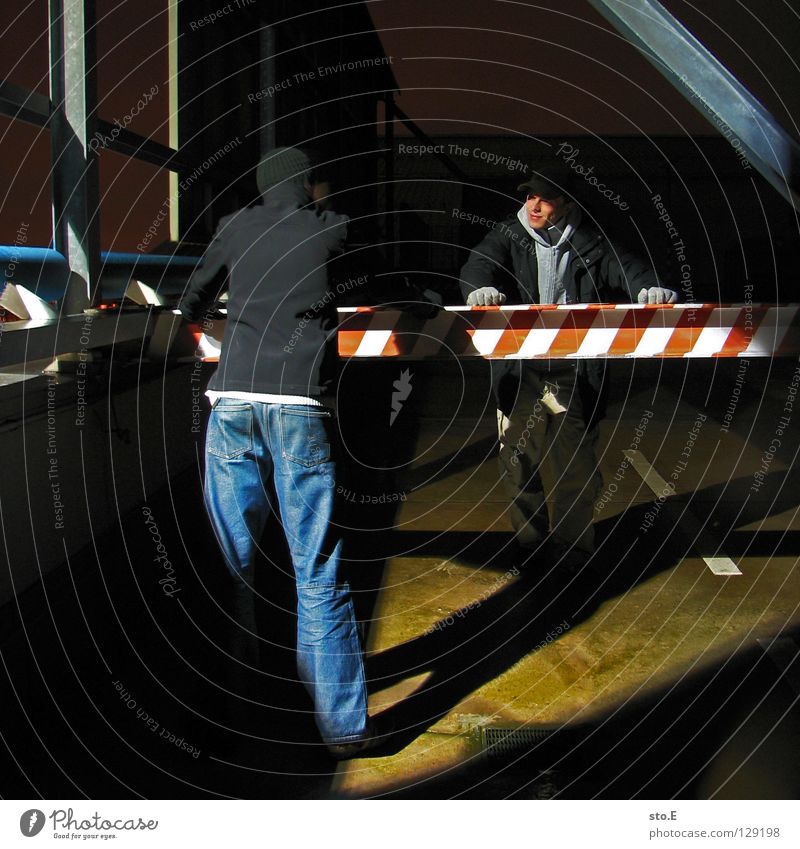 dark | two men standing Fellow Posture Night Dark Black Light Artificial light Lamp Parking level Gloves Cap Glittering Midnight Vantage point Far-off places