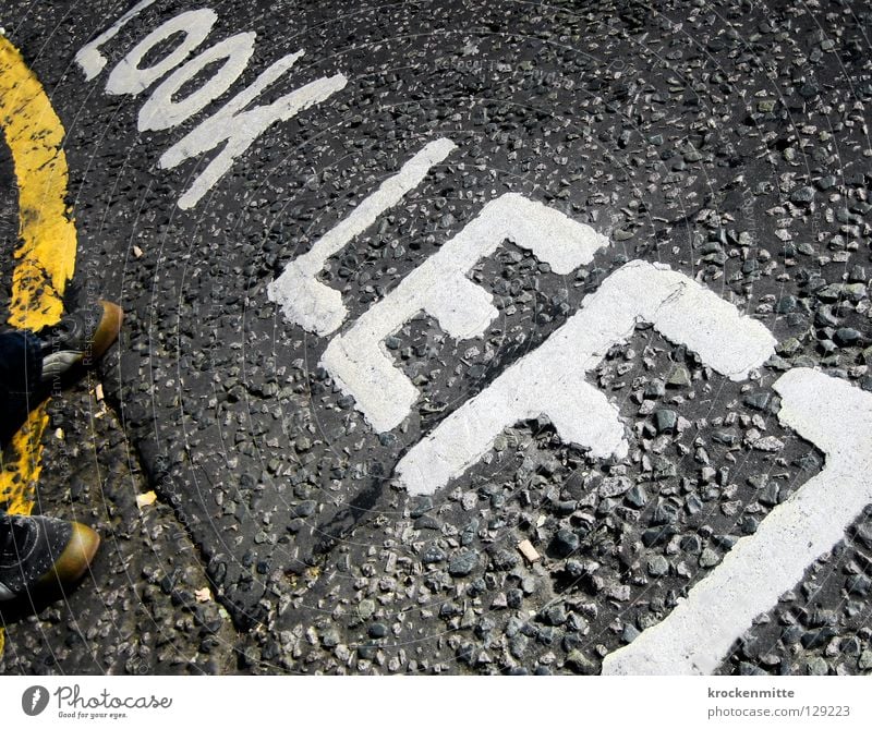 look left Traverse Pedestrian Street crossing London England Typography Town Asphalt Footwear Transport Vacation & Travel Great Britain Left-hand traffic Text