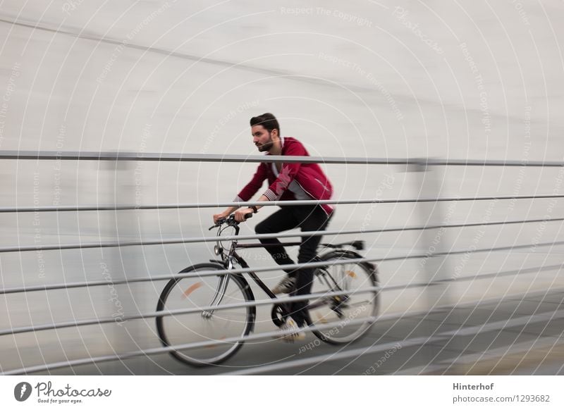 Cycling - young man riding a bicycle Style Joy Cycling tour Sports Bicycle Human being Masculine Life 1 18 - 30 years Youth (Young adults) Adults Town