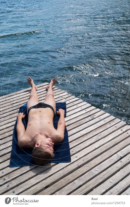 sunbath Vacation & Travel Tourism Trip Far-off places Summer Summer vacation Sun Sunbathing Footbridge Swimming & Bathing Swimming trunks Human being Masculine