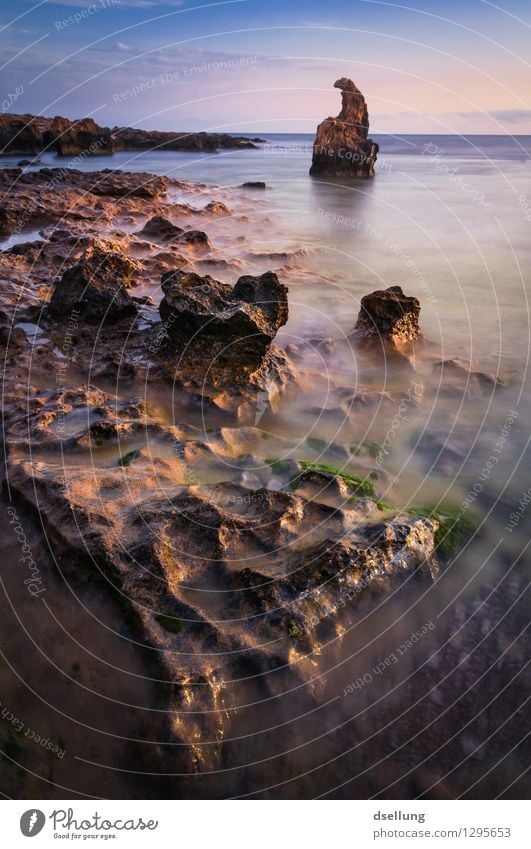 gentle surf II. Environment Nature Landscape Elements Earth Water Sky Clouds Rock Waves Coast Ocean Sharp-edged Warmth Maritime Wet Strong Brown Red Violet