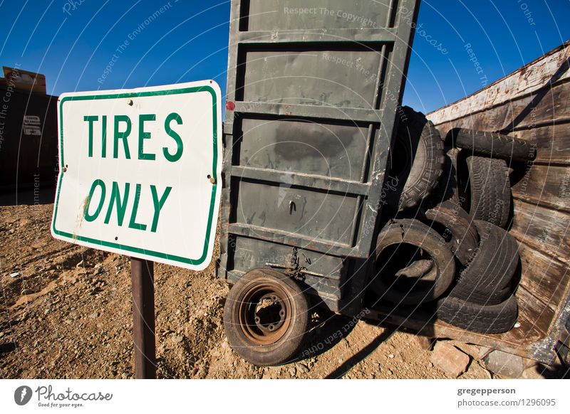 Recycled tires. Environment Old broken Discarded dump dumpster recycle Scrap Tire Trash used Worn out Colour photo Exterior shot Deserted Copy Space middle Day