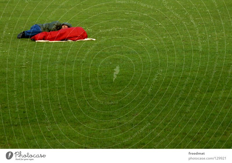 corner dormouse Meadow Grass Green Sleep Sleeping bag Tramp Relaxation Cold Spring Park Free space Places Left Duck down Red Patch of colour Minimal Tidy up