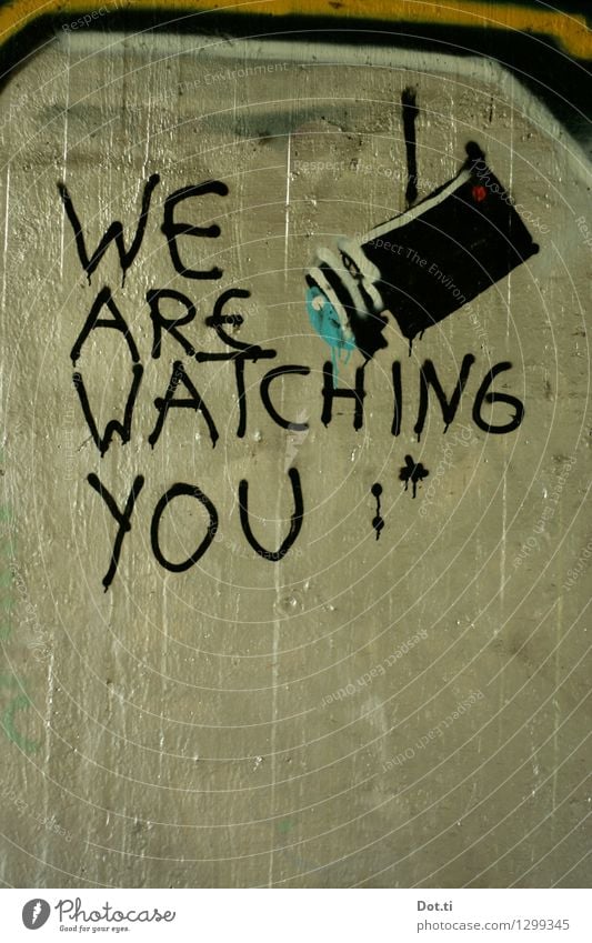 paranoia paradise Deserted Wall (barrier) Wall (building) Concrete Sign Characters Graffiti Observe Curiosity Gold Black Watchfulness Threat Society