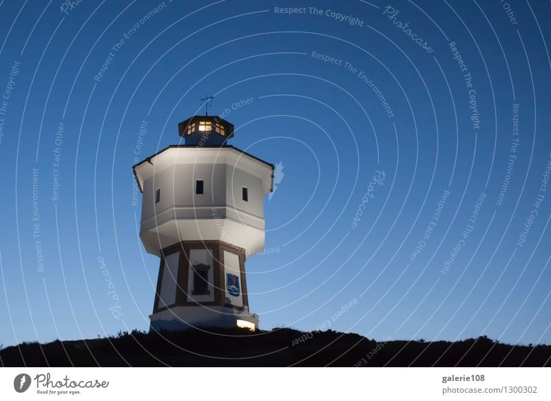 Water tower on Langeoog at blue hour Vacation & Travel Tourism Island Tall Blue Black Moody Landmark Colour photo Exterior shot Deserted Copy Space right