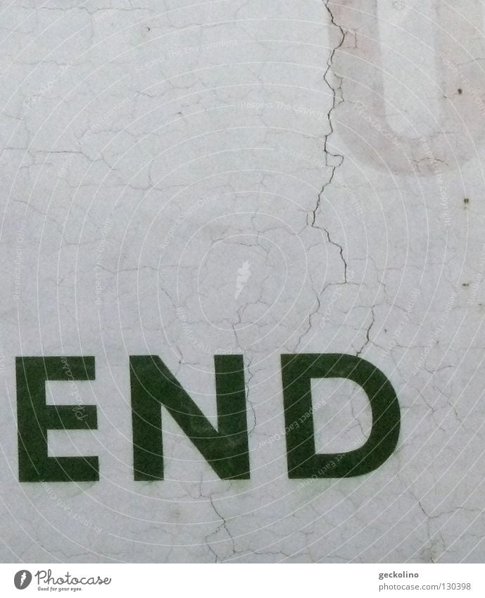 The End Past Wall (building) Advertising Plaster Letters (alphabet) Typography Word Quit Characters Transience from wall advertisement Crack & Rip & Tear letter