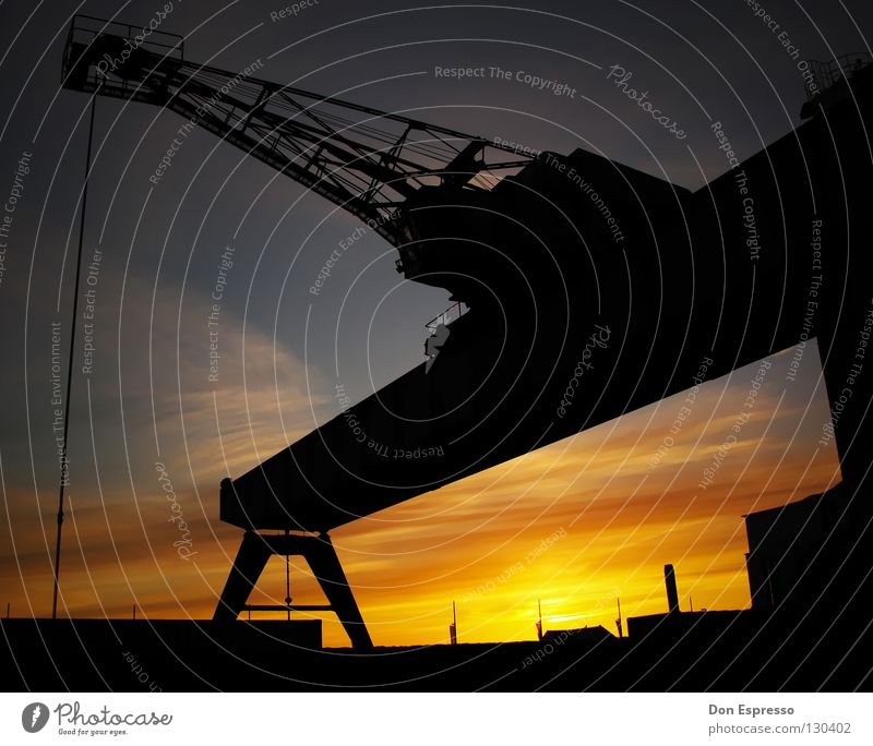 Fishtown-Sundown Sunset Physics Bremerhaven Crane Clouds Back-light Dusk Evening Industry Sky industrial romance Warmth loading crane Harbour Shipyard