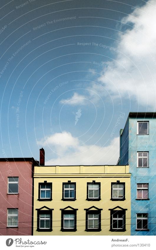 tricolour Multicoloured House (Residential Structure) Window Flat (apartment) Red Yellow Facade Wall (building) Clouds Pastel tone Plaster Neighbor Cottbus