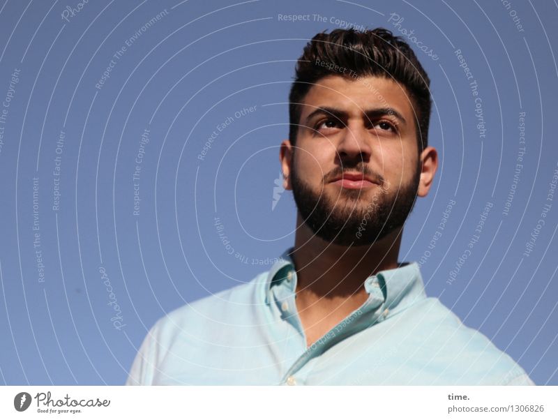 young man with critical look Masculine 1 Human being Sky Shirt Brunette Short-haired Beard Observe Think Looking Wait Uniqueness Self-confident Cool (slang)