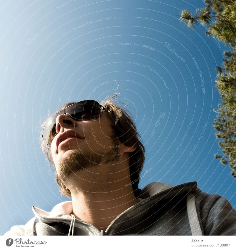 lunch break Man Youth (Young adults) Stand Break Midday Relaxation Eyeglasses Facial hair Tree Physics Human being Posture Sun enjoy sunglasses Warmth