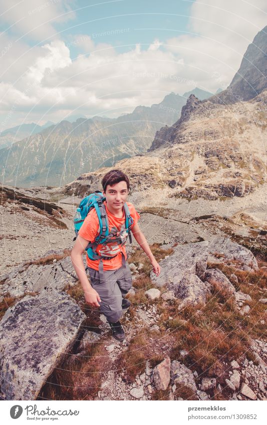 Boy hiking in the mountains Vacation & Travel Trip Adventure Mountain Hiking Young man Youth (Young adults) 1 Human being 13 - 18 years Rock Joy hiker