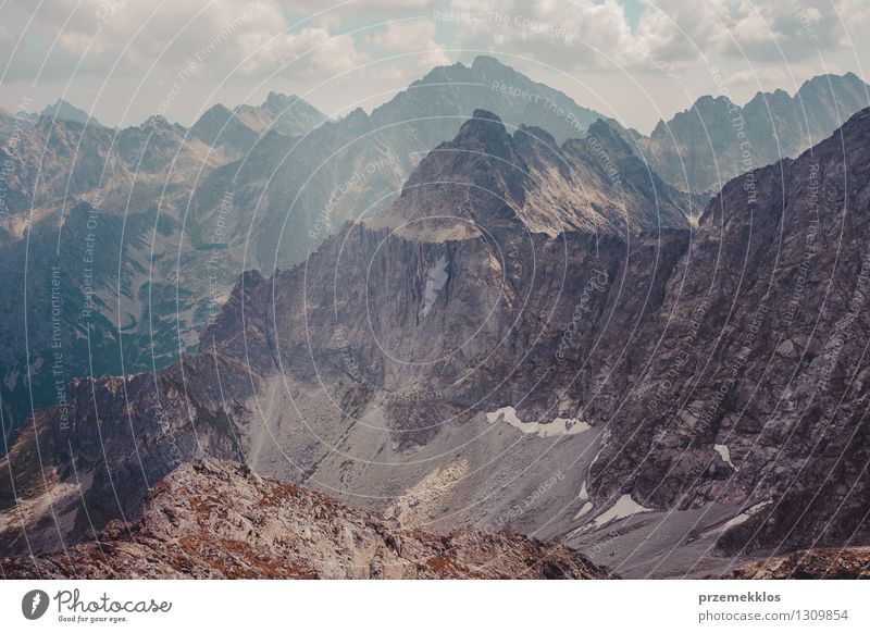 Mountain landscape in Tatras Nature Landscape Clouds Summer Rock Peak distant Height range Slope Wide Colour photo Exterior shot Deserted Day Wide angle