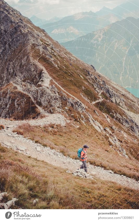 Boy hiking in the Tatra Mountains Lifestyle Vacation & Travel Trip Adventure Freedom Summer Summer vacation Hiking Young man Youth (Young adults) 1 Human being