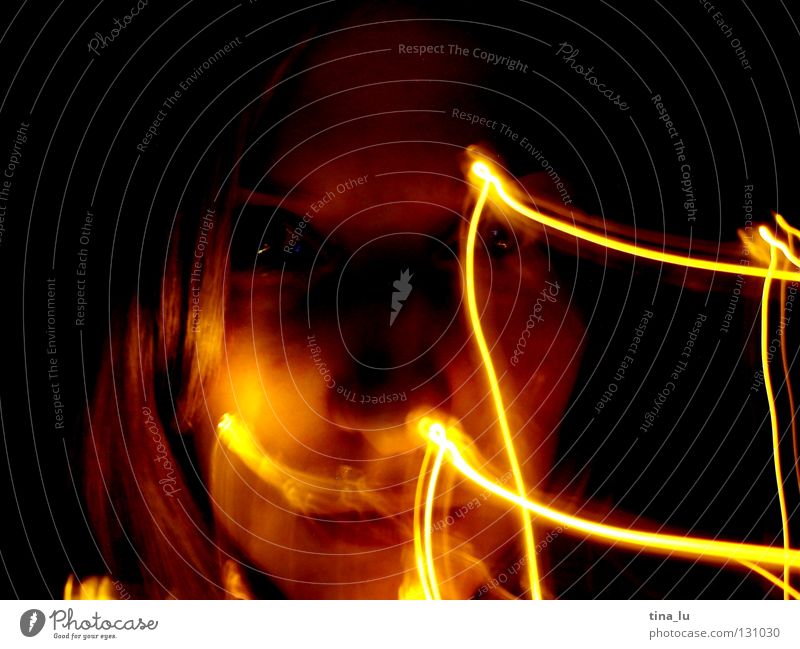 glow Physics Glow Light Visual spectacle Fairy lights Dark Planning Yellow Black Long exposure Smear Warmth Lamp glowing Face Looking Bright spot Orange