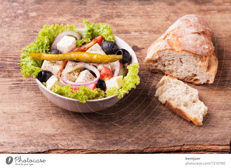 Greek salad Food Lettuce Salad Bread Organic produce Vegetarian diet Bowl Cheap Good Baguette Chili Olive feta Cheese Onion Deserted Rustic Wood Tomato