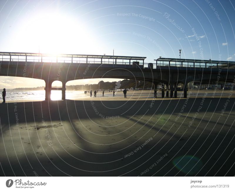 Beach gate Human being Relaxation Sky Sunset Ocean sea morse sun clouds s&#322 o&#324 chmury ludzie Gate bridge blue