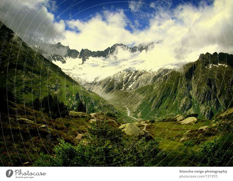 swiss fairy tale Clouds Green Mountain meadow Switzerland Hope Vantage point Sky Blue Alpine pasture Alps Snow Rock mountain view