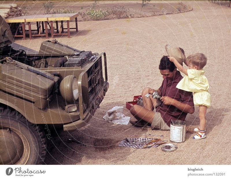 Father and Son Colour photo Exterior shot Tool Human being Toddler Man Adults Family & Relations 2 1 - 3 years Sand Warmth Desert Gamboura Cameroon Africa Car