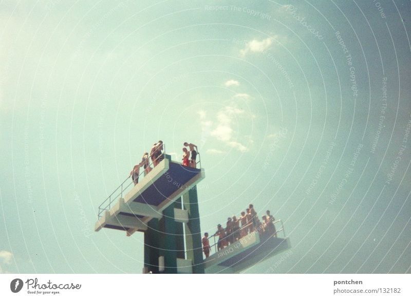 Many young people on a diving platform in front of a blue sky Swimming pool Freedom Summer Sun Sports Human being Infancy Group Water Sky Beautiful weather