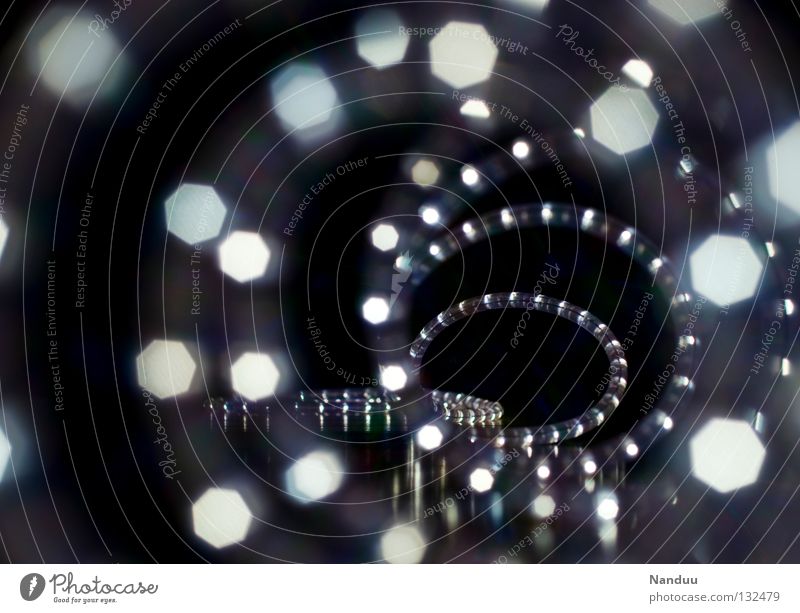 Tunnel to light Light Point of light Spiral Tube light Hose Lamp Decoration Blur Depth of field Dark Infinity Symbols and metaphors Tunnel vision Metamorphosis