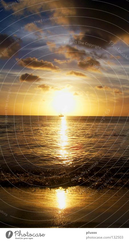 On the horizon Tobago Ocean Sunset Moody Yellow Red Waves Beach Sandy beach Reflection Watercraft Horizon Forget To enjoy Clouds Sky Light Night Fishing boat