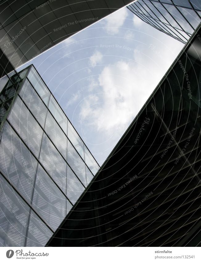 Brilliant prospects Glass Steel Sky Clouds Perspective Detail Section of image Partially visible Under Tall Upward Transparent Mirror Reflection Glittering