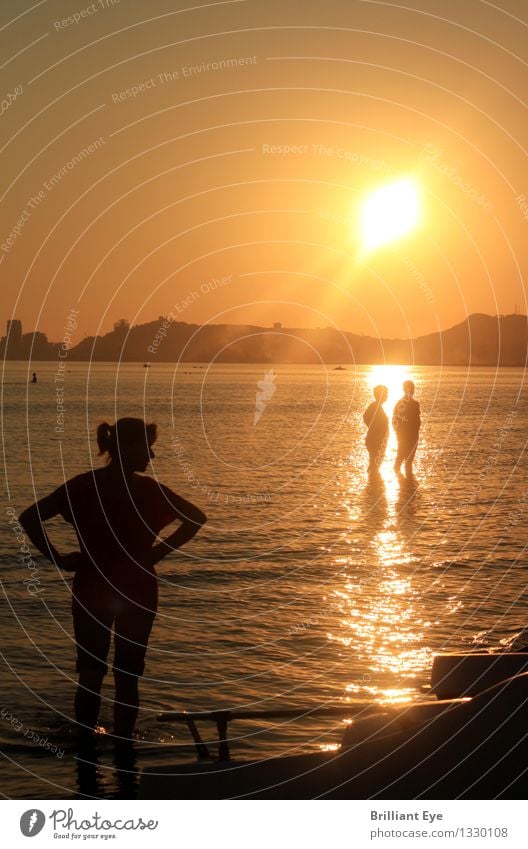 Jealousy scenes in the beach holidays Lifestyle Human being Masculine Feminine Sunrise Sunset Sunlight Beautiful weather Coast Lakeside Beach Ocean