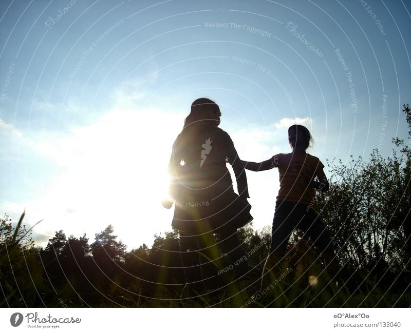 Sun kids! Joy Playing Child Human being Friendship Grass Emotions Perspective Sunset Evening Light