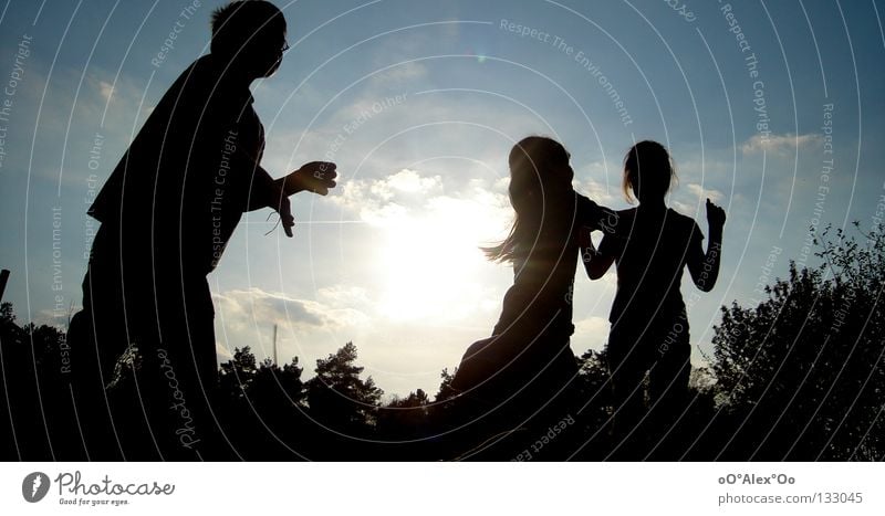 shining lights Joy Playing Child Human being Friendship Sky Grass Emotions Perspective Sunset Evening Light Looking