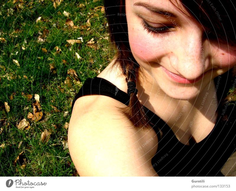 summery smile Colour photo Downward Joy Summer Feminine Young woman Youth (Young adults) Head 1 Human being Meadow Brunette Braids Laughter Happiness Warmth