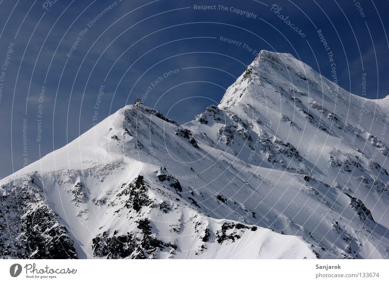 The mountain calls ("Jollerijohidüüüü!") Austria Grossglockner Peak Winter High mountain region Mountain Snow Blue sky Snowcapped peak